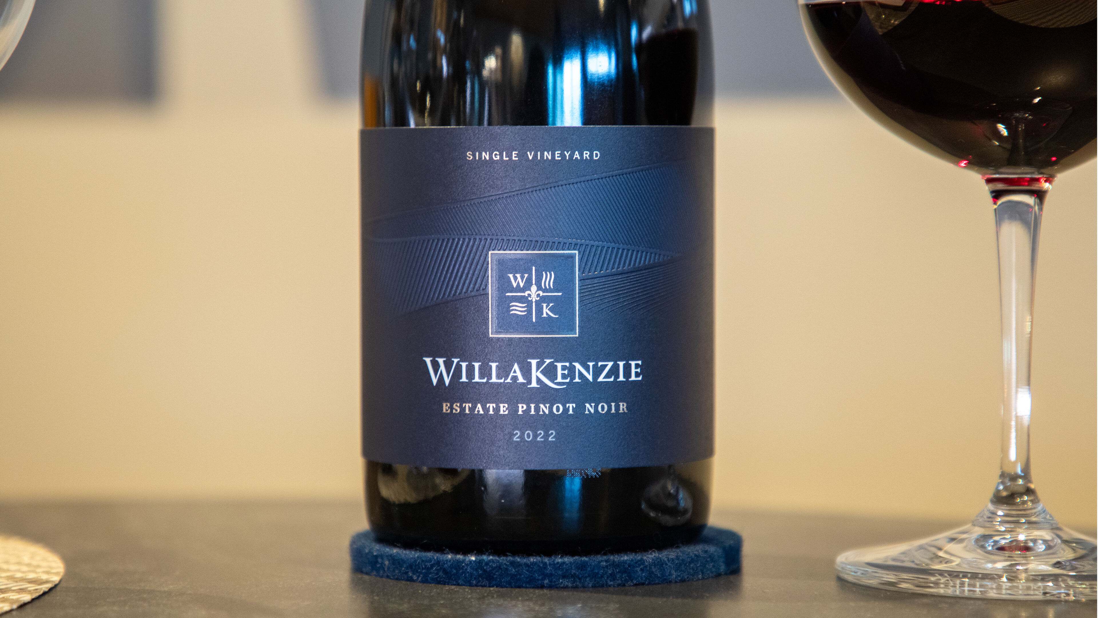 A close up of the new 2022 WillaKenzie Estate Pinot Noir label